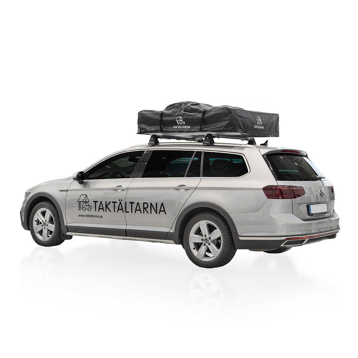 Taktält med transportskydd på ihopfällt på en volkswagen passat
