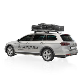 Taktält med transportskydd på ihopfällt på en volkswagen passat